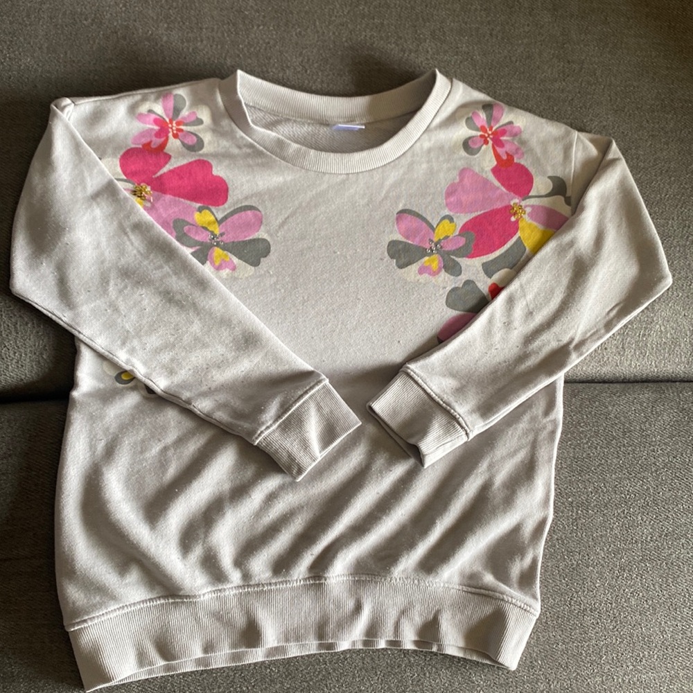 I am selling a grey and floral Sweater for kids and is from Gymboree
